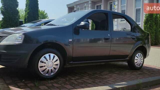 Черный Рено Логан, объемом двигателя 1.39 л и пробегом 173 тыс. км за 4500 $, фото 1 на Automoto.ua