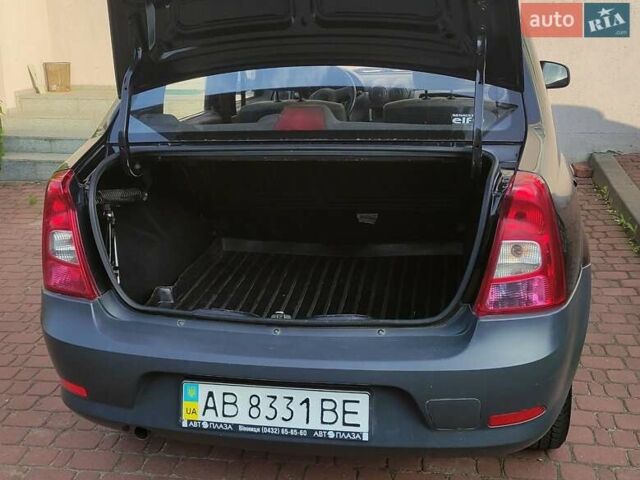Черный Рено Логан, объемом двигателя 1.39 л и пробегом 173 тыс. км за 4500 $, фото 2 на Automoto.ua