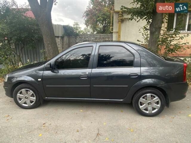 Черный Рено Логан, объемом двигателя 1.4 л и пробегом 145 тыс. км за 5600 $, фото 8 на Automoto.ua