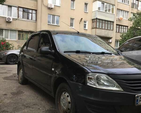 Черный Рено Логан, объемом двигателя 1.39 л и пробегом 224 тыс. км за 2600 $, фото 1 на Automoto.ua