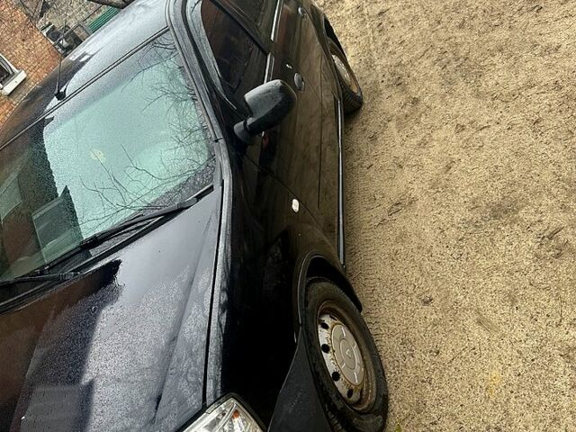 Чорний Рено Логан, об'ємом двигуна 1.4 л та пробігом 220 тис. км за 2100 $, фото 12 на Automoto.ua