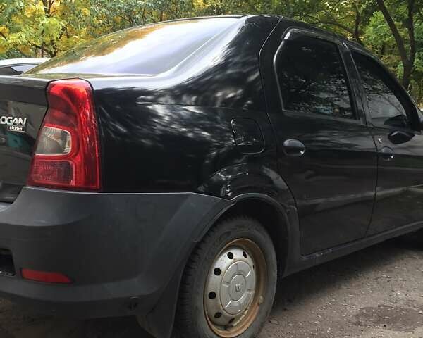 Черный Рено Логан, объемом двигателя 1.39 л и пробегом 224 тыс. км за 2600 $, фото 4 на Automoto.ua