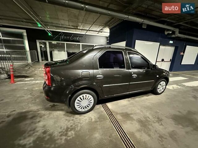 Черный Рено Логан, объемом двигателя 1.39 л и пробегом 149 тыс. км за 5200 $, фото 2 на Automoto.ua