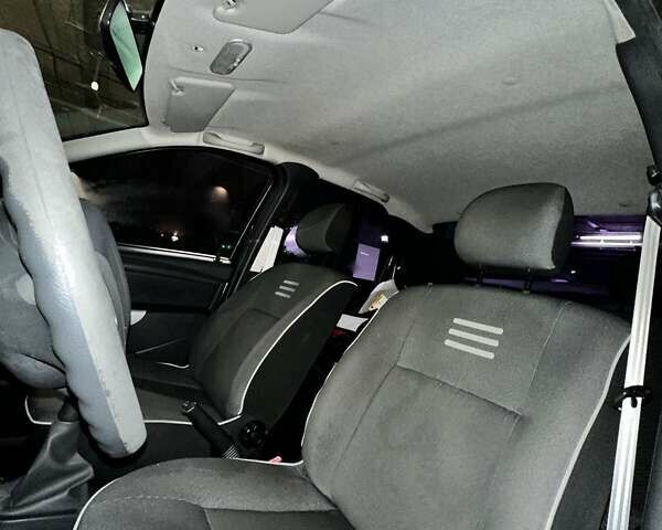 Черный Рено Логан, объемом двигателя 1.39 л и пробегом 149 тыс. км за 5200 $, фото 13 на Automoto.ua