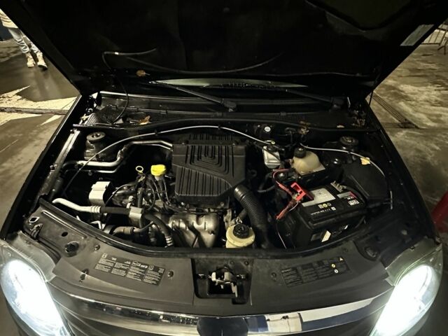 Черный Рено Логан, объемом двигателя 1.4 л и пробегом 149 тыс. км за 5200 $, фото 7 на Automoto.ua