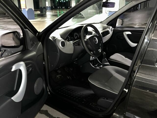 Черный Рено Логан, объемом двигателя 1.4 л и пробегом 149 тыс. км за 5200 $, фото 6 на Automoto.ua