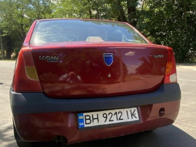 Красный Рено Логан, объемом двигателя 1.4 л и пробегом 300 тыс. км за 3000 $, фото 2 на Automoto.ua