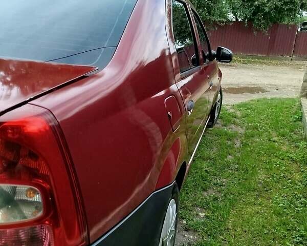 Червоний Рено Логан, об'ємом двигуна 1.39 л та пробігом 244 тис. км за 2950 $, фото 7 на Automoto.ua