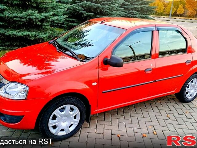 Красный Рено Логан, объемом двигателя 1.4 л и пробегом 130 тыс. км за 6450 $, фото 1 на Automoto.ua