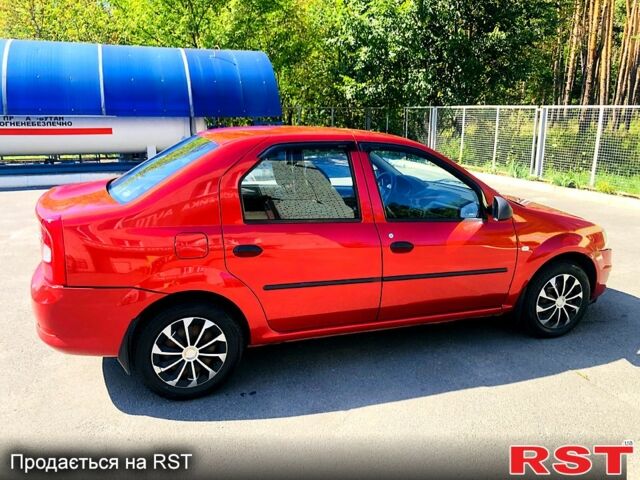 Красный Рено Логан, объемом двигателя 1.4 л и пробегом 189 тыс. км за 3850 $, фото 3 на Automoto.ua