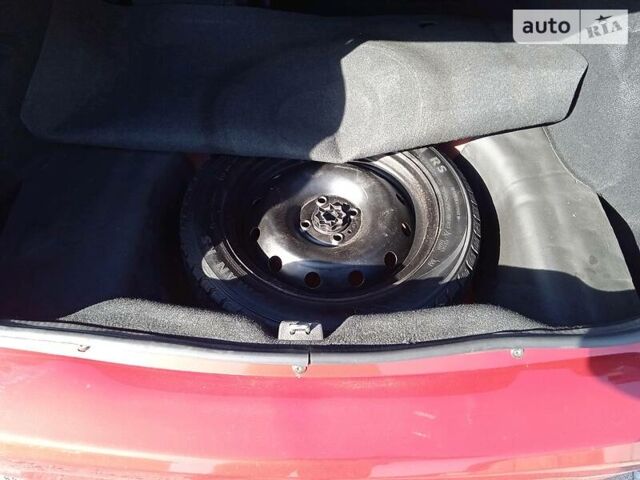 Красный Рено Логан, объемом двигателя 1.4 л и пробегом 120 тыс. км за 6000 $, фото 18 на Automoto.ua