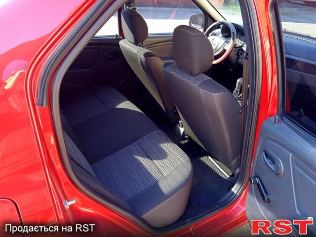 Червоний Рено Логан, об'ємом двигуна 1.4 л та пробігом 119 тис. км за 6555 $, фото 7 на Automoto.ua