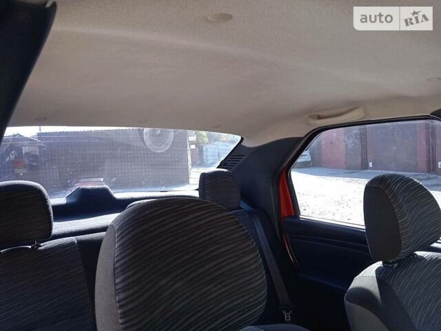 Красный Рено Логан, объемом двигателя 1.4 л и пробегом 120 тыс. км за 6000 $, фото 4 на Automoto.ua