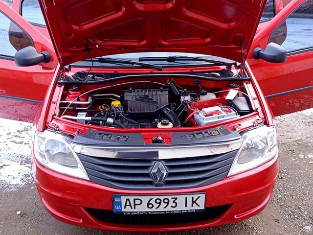 Червоний Рено Логан, об'ємом двигуна 1.4 л та пробігом 119 тис. км за 6555 $, фото 6 на Automoto.ua