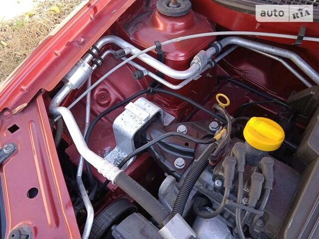 Красный Рено Логан, объемом двигателя 1.4 л и пробегом 120 тыс. км за 6000 $, фото 11 на Automoto.ua