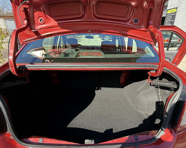 Червоний Рено Логан, об'ємом двигуна 1.15 л та пробігом 220 тис. км за 4200 $, фото 4 на Automoto.ua