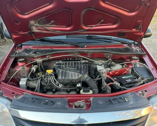 Красный Рено Логан, объемом двигателя 1.6 л и пробегом 304 тыс. км за 4950 $, фото 13 на Automoto.ua