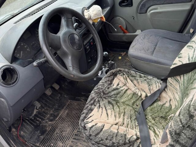 Серый Рено Логан, объемом двигателя 1.8 л и пробегом 80 тыс. км за 650 $, фото 11 на Automoto.ua