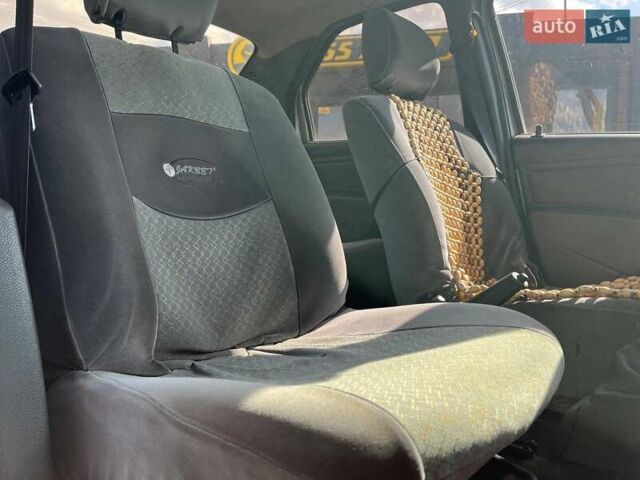 Серый Рено Логан, объемом двигателя 1.39 л и пробегом 218 тыс. км за 2900 $, фото 17 на Automoto.ua