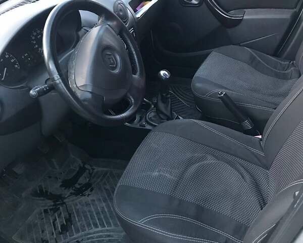Сірий Рено Логан, об'ємом двигуна 1.39 л та пробігом 276 тис. км за 3541 $, фото 5 на Automoto.ua
