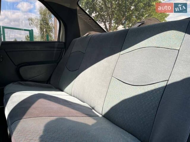 Серый Рено Логан, объемом двигателя 1.39 л и пробегом 218 тыс. км за 2900 $, фото 12 на Automoto.ua