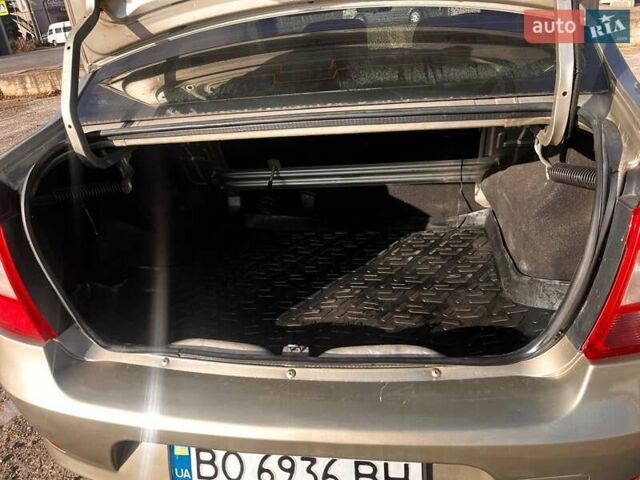 Серый Рено Логан, объемом двигателя 1.39 л и пробегом 296 тыс. км за 3500 $, фото 12 на Automoto.ua