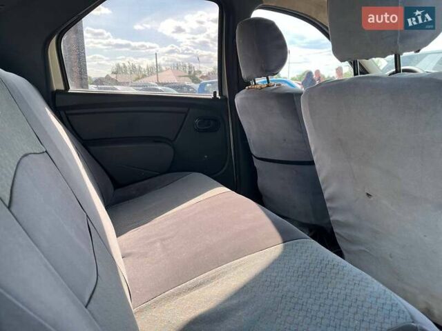 Серый Рено Логан, объемом двигателя 1.39 л и пробегом 218 тыс. км за 2900 $, фото 19 на Automoto.ua