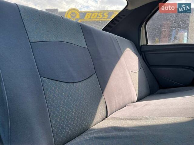 Серый Рено Логан, объемом двигателя 1.39 л и пробегом 218 тыс. км за 2900 $, фото 20 на Automoto.ua