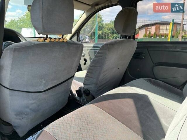 Серый Рено Логан, объемом двигателя 1.39 л и пробегом 218 тыс. км за 2900 $, фото 11 на Automoto.ua
