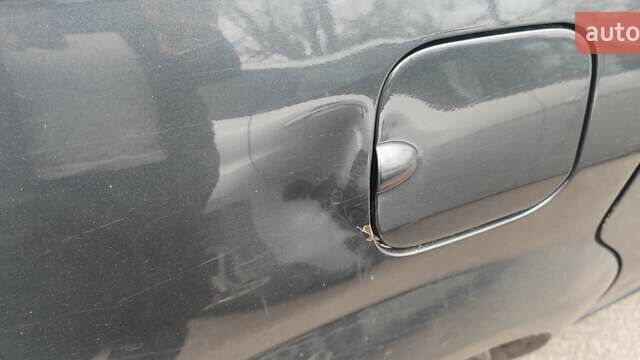 Серый Рено Логан, объемом двигателя 1.39 л и пробегом 250 тыс. км за 3200 $, фото 10 на Automoto.ua