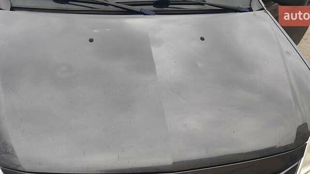 Серый Рено Логан, объемом двигателя 1.39 л и пробегом 250 тыс. км за 3200 $, фото 12 на Automoto.ua