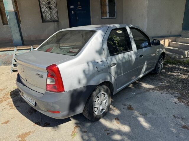 Серый Рено Логан, объемом двигателя 1.4 л и пробегом 270 тыс. км за 4500 $, фото 2 на Automoto.ua