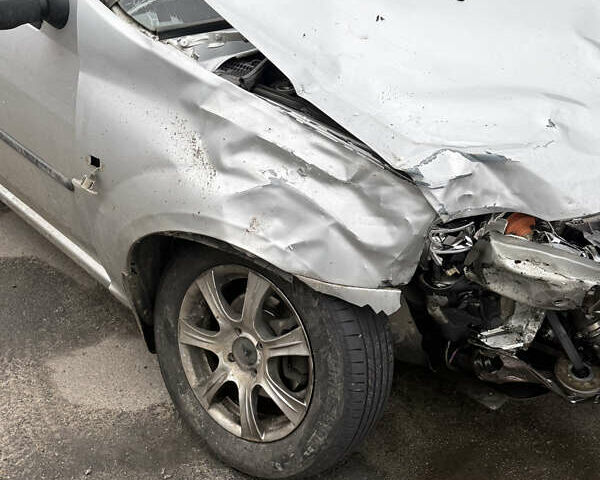 Серый Рено Логан, объемом двигателя 1.46 л и пробегом 119 тыс. км за 1800 $, фото 1 на Automoto.ua