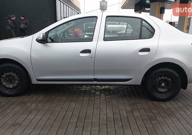 Серый Рено Логан, объемом двигателя 1.46 л и пробегом 223 тыс. км за 7900 $, фото 1 на Automoto.ua