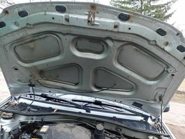 Сірий Рено Логан, об'ємом двигуна 1.6 л та пробігом 257 тис. км за 4200 $, фото 18 на Automoto.ua