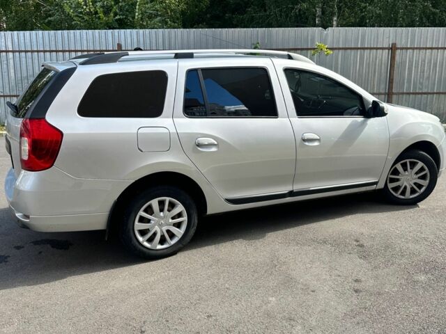 Серый Рено Логан, объемом двигателя 0.9 л и пробегом 155 тыс. км за 6900 $, фото 3 на Automoto.ua