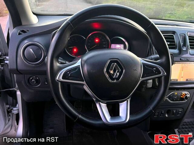 Сірий Рено Логан, об'ємом двигуна 1.5 л та пробігом 59 тис. км за 11800 $, фото 1 на Automoto.ua