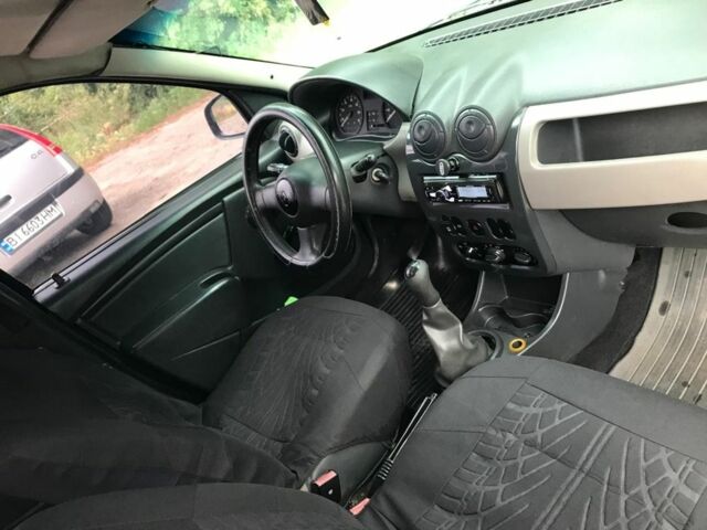 Синий Рено Логан, объемом двигателя 1.4 л и пробегом 259 тыс. км за 1999 $, фото 8 на Automoto.ua