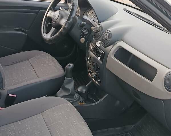 Синій Рено Логан, об'ємом двигуна 1.39 л та пробігом 183 тис. км за 4500 $, фото 5 на Automoto.ua