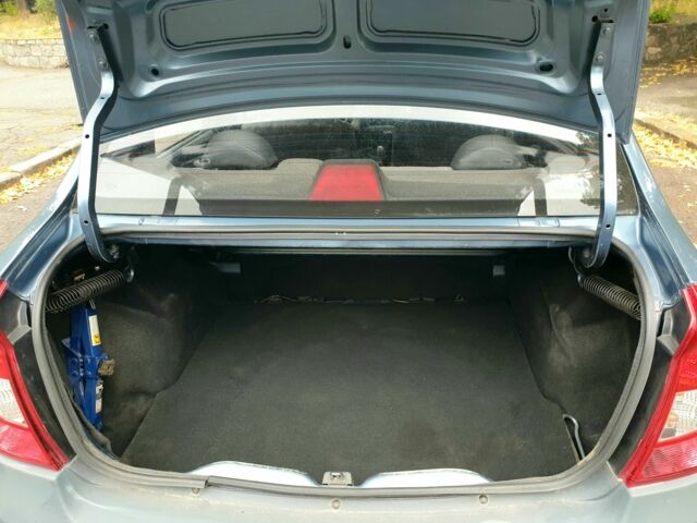 Синий Рено Логан, объемом двигателя 1.4 л и пробегом 250 тыс. км за 2900 $, фото 12 на Automoto.ua