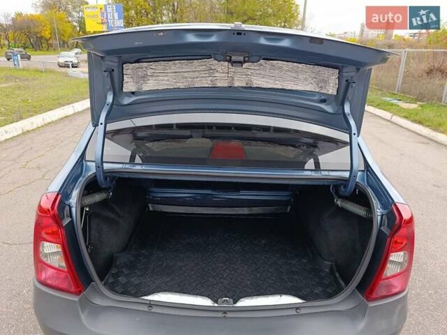 Синий Рено Логан, объемом двигателя 1.4 л и пробегом 75 тыс. км за 4850 $, фото 12 на Automoto.ua