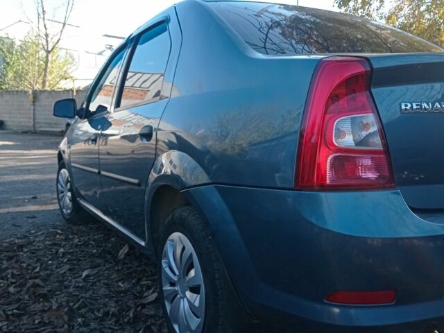 Синій Рено Логан, об'ємом двигуна 1.4 л та пробігом 240 тис. км за 4200 $, фото 3 на Automoto.ua