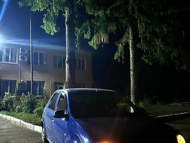 Синий Рено Логан, объемом двигателя 1.4 л и пробегом 190 тыс. км за 4000 $, фото 5 на Automoto.ua