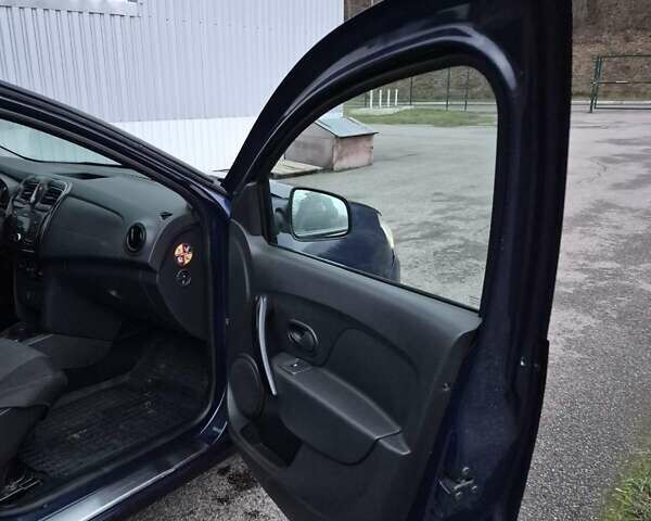 Синий Рено Логан, объемом двигателя 1 л и пробегом 150 тыс. км за 2999 $, фото 17 на Automoto.ua