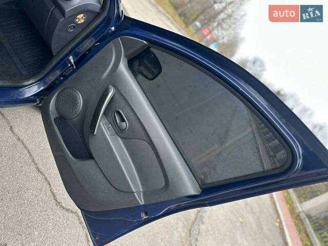Синій Рено Логан, об'ємом двигуна 1 л та пробігом 98 тис. км за 5400 $, фото 8 на Automoto.ua