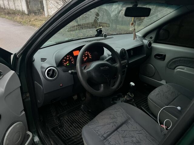 Зеленый Рено Логан, объемом двигателя 1.4 л и пробегом 305 тыс. км за 2300 $, фото 8 на Automoto.ua