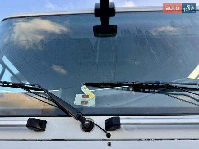 Белый Рено Магнум, объемом двигателя 12.78 л и пробегом 990 тыс. км за 12000 $, фото 2 на Automoto.ua