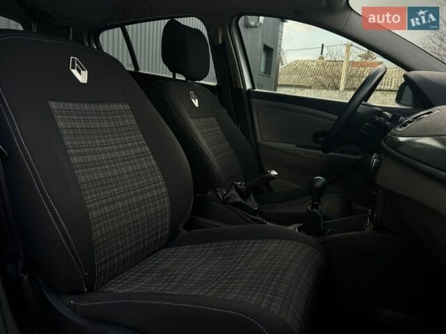 Білий Рено Меган, об'ємом двигуна 1.46 л та пробігом 267 тис. км за 7499 $, фото 9 на Automoto.ua