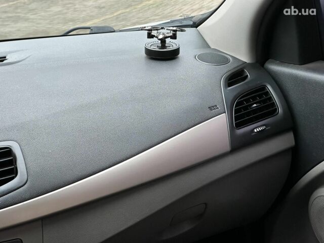 Белый Рено Меган, объемом двигателя 1.5 л и пробегом 275 тыс. км за 6440 $, фото 17 на Automoto.ua