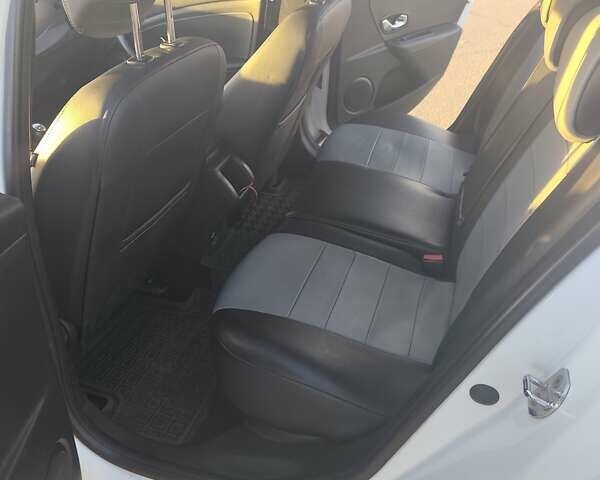 Білий Рено Меган, об'ємом двигуна 1.46 л та пробігом 188 тис. км за 9600 $, фото 12 на Automoto.ua